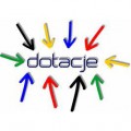 Logo programu. Kolorowe strzałki wskazujące na słowo "dotacje" i otaczające je.